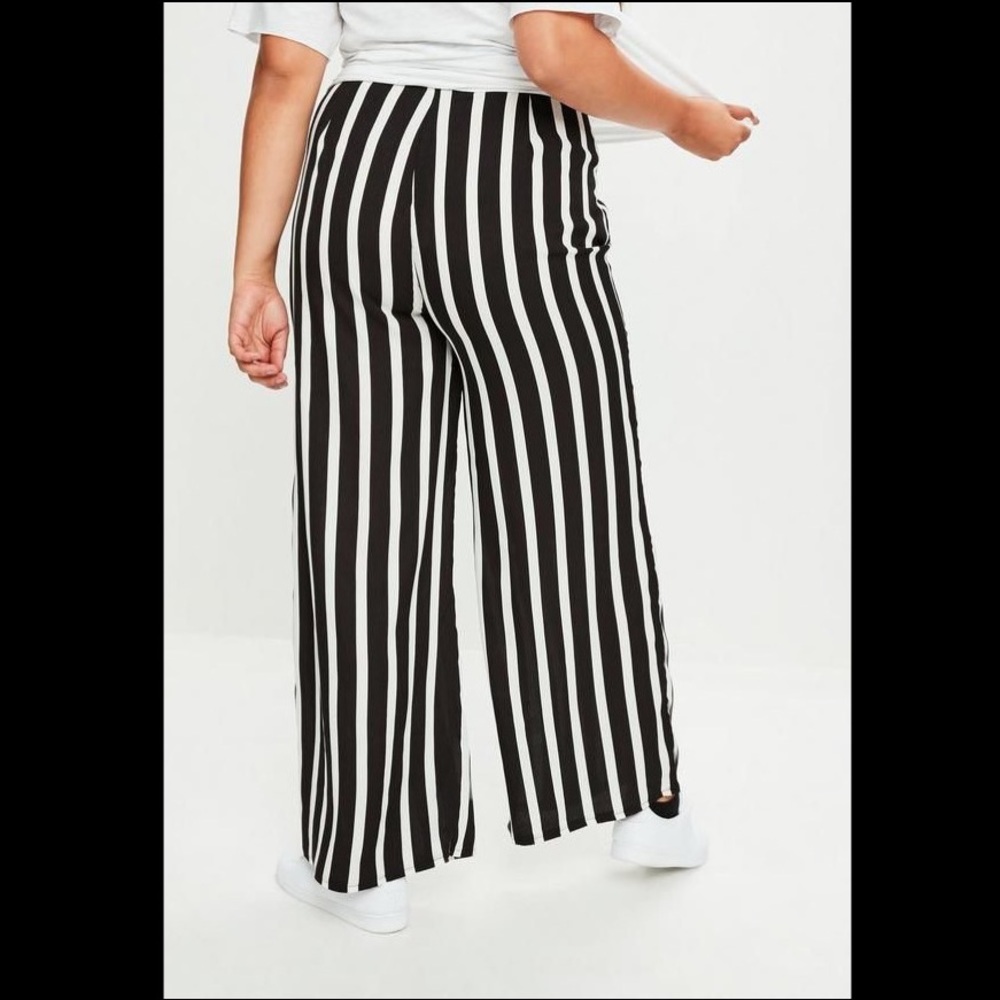 Plus Size Black Striped Wide Leg Trousers
Size: 14